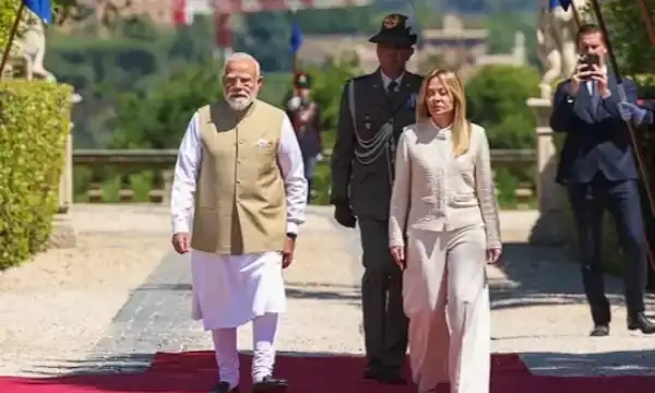 Prime Minister Narendra Modi and Italian PM Giorgia Meloni discussing the India-Italy defense partnership and strategic bilateral ties during their official high-level meeting. Photo Credit: Official X Handle / @narendramodi
