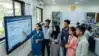 A realistic scene of young Maharashtrian students in a modern, well-lit tech lab at a state college, learning Artificial Intelligence modules on a large screen as part of the Maharashtra AI Policy 2026 – Akhand News.