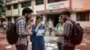 Indian students outside exam center holding admit cards, concerned after NEET UG 2026 cancellation news