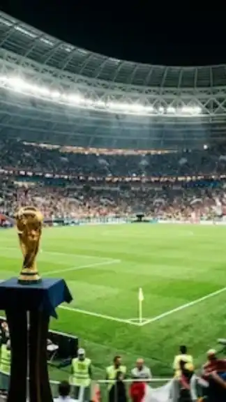 Modern football stadium with a championship trophy representing the FIFA World Cup 2026 tournament.