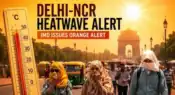 Delhi-NCR heatwave alert with empty roads, extreme summer temperature conditions, people protecting themselves from heat, urban skyline under harsh sunlight, realistic weather emergency scene in Delhi India
