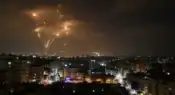 Night skyline showing defensive missile interceptions during a period of heightened regional tensions. Representative image used for illustrative purposes.