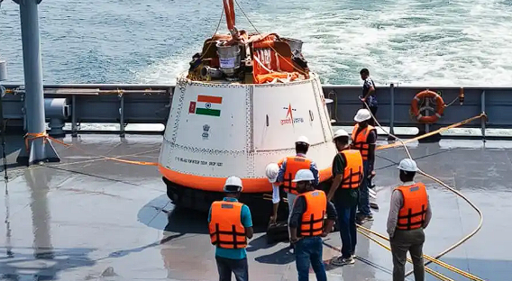 ISRO Gaganyaan Crew Module being dropped from a Chinook helicopter with parachutes deployed. Image Credit: ISRO Official