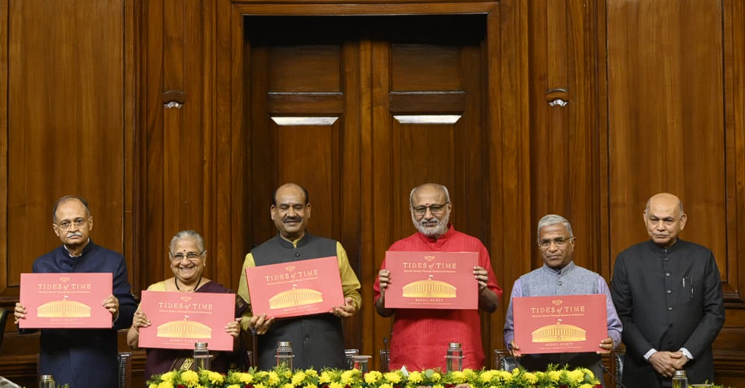 Vice President releases 'Tides of Time': Hon. Shri C.P. Radhakrishnan with Speaker Shri Om Birla and author Smt. Sudha Murty at the book release ceremony in Samvidhan Sadan. (Image Source: Official X Handle of the Vice President of India)
